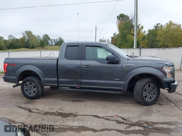 2015 Ford F-150 XLT with VIN 1FTEX1EP7FFA52955, listed as a IAAI auction lot 40799137 with 134,290 mi miles. Bid and sale history available at carsss.com. Image 14.