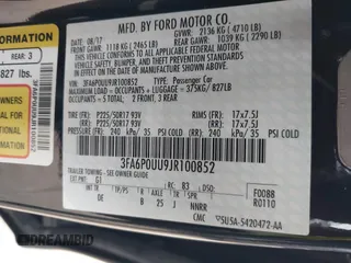 2018 Ford Fusion Hybrid S with VIN 3FA6P0UU9JR100852, listed as a IAAI auction lot 41516157 with 63,458 mi miles. Bid and sale history available at carsss.com. Image 9.