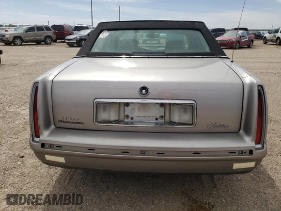 1998 Cadillac DeVille with VIN 1G6KD54Y2WU797558, listed as a Copart auction lot 49451785 with 85,899 mi miles and Salvage Title. Bid and sale history available at carsss.com. Image 6.