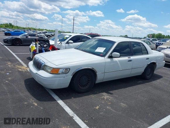 2001 Mercury Grand Marquis LS with VIN 2MEFM75W71X614856, listed as a IAAI auction lot 42195921 with 113,352 mi miles and . Bid and sale history available at DreamBid. Image 2.
