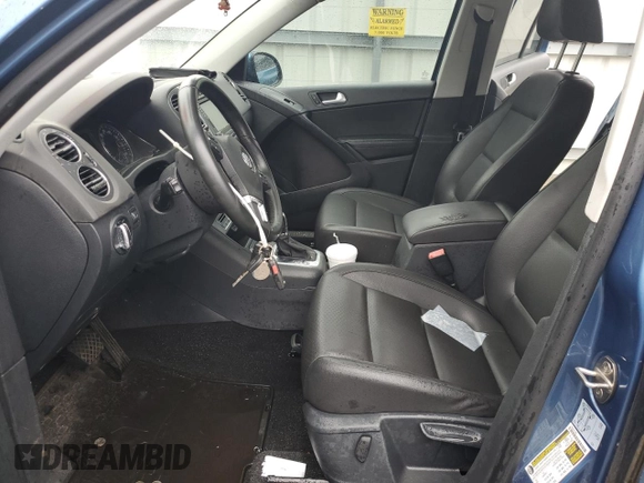 2017 Volkswagen Tiguan S with VIN WVGAV7AX7HW501479, listed as a Copart auction lot 56582705 with 157,414 mi miles and Clean Title. Bid and sale history available at DreamBid. Image 7.