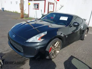2013 Nissan 370Z with VIN JN1AZ4EH1DM880739, listed as a IAAI auction lot 40474120 with 76,369 mi miles. Bid and sale history available at carsss.com. Image 2.