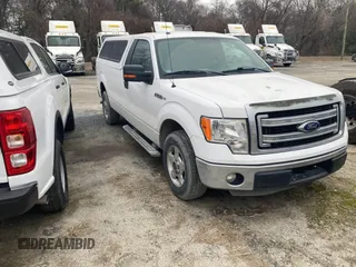 2014 Ford F-150 XL with VIN 1FTNF1CF5EKD79597, listed as a IAAI auction lot 41511800 with 100,758 mi miles and . Bid and sale history available at DreamBid. Image 1.