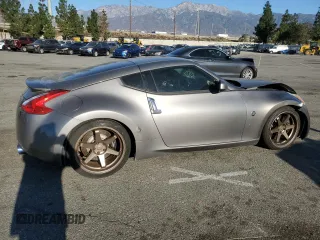 2009 Nissan 370Z Touring with VIN JN1AZ44E79M401576, listed as a Copart auction lot 89177535 with 131,622 mi miles and Salvage Title. Bid and sale history available at carsss.com. Image 3.