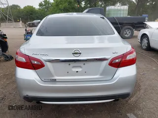 2018 Nissan Altima SR with VIN 1N4AL3AP6JC151861, listed as a IAAI auction lot 40010666 with 140,228 mi miles and . Bid and sale history available at DreamBid. Image 16.