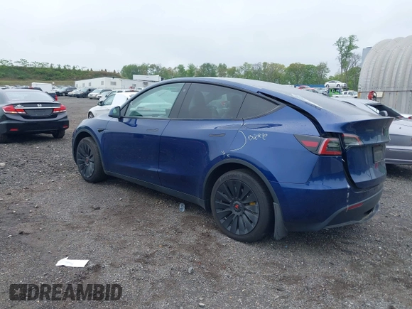 2023 Tesla Model Y Long Range z VIN 7SAYGDEE6PF603981, wystawiony jako IAAI lot #42133348 z przebiegiem 28 566 mil mil oraz . Historia ofert i sprzedaży dostępna na DreamBid. Obrazek 3.