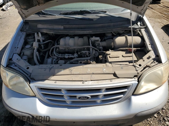 1999 Ford Windstar LX with VIN 2FMZA5140XBA04377, listed as a Copart auction lot 73172914 with 176,663 mi miles and Salvage Title. Bid and sale history available at carsss.com. Image 12.