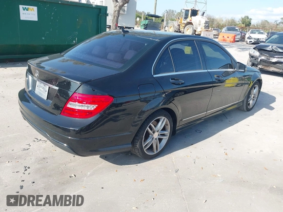 2014 Mercedes-Benz C-Class C 250 Sport with VIN WDDGF4HB3EG250671, listed as a IAAI auction lot 41607910 with 136,556 mi miles. Bid and sale history available at carsss.com. Image 4.