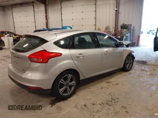 2016 Ford Focus SE with VIN 1FADP3KE2GL377824, listed as a IAAI auction lot 41461648 with 112,038 mi miles and . Bid and sale history available at carsss.com. Image 4.