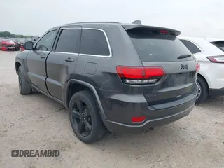 2015 Jeep Grand Cherokee Altitude with VIN 1C4RJEAG3FC219782, listed as a IAAI auction lot 42076212 with 194,910 mi miles. Bid and sale history available at carsss.com. Image 3.