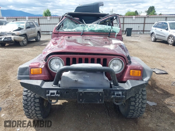 2003 Jeep Wrangler X z VIN 1J4FA39S73P349014, wystawiony jako IAAI lot #42582747 z przebiegiem 50 525 mil mil oraz . Historia ofert i sprzedaży dostępna na DreamBid. Obrazek 13.