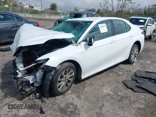 2023 Toyota Camry LE with VIN 4T1C11AK9PU158190, listed as a IAAI auction lot 41666927 with 92,730 mi miles and . Bid and sale history available at DreamBid. Image 2.