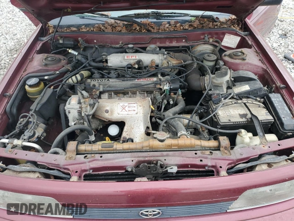 1991 Toyota Camry DLX z VIN 4T1SV21E0MU450578, wystawiony jako Copart lot #73990024 z przebiegiem 149 342 mil mil oraz Czysty tytuł • Clean title. Historia ofert i sprzedaży dostępna na DreamBid. Obrazek 11.