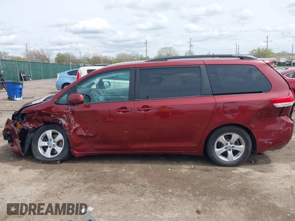 2014 Toyota Sienna LE AAS with VIN 5TDKK3DC4ES462090, listed as a IAAI auction lot 41942354 with 215,814 mi miles. Bid and sale history available at carsss.com. Image 14.