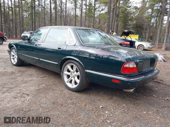 2003 Jaguar XJ with VIN SAJDA15B53MF53212, listed as a IAAI auction lot 41613266 with 180,165 mi miles and . Bid and sale history available at DreamBid. Image 3.