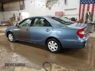2004 Toyota Camry LE with VIN 4T1BE32K64U812388, listed as a Copart auction lot 82777563 with 209,219 mi miles and Clean Title. Bid and sale history available at carsss.com. Image 2.