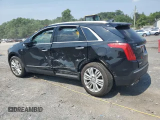 2019 Cadillac XT5 Premium Luxury AWD with VIN 1GYKNFRS9KZ223065, listed as a Copart auction lot 60902645 with 101,168 mi miles and Salvage title. Bid and sale history available at DreamBid. Image 2.