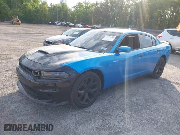 2015 Dodge Charger SXT with VIN 2C3CDXHG1FH848019, listed as a IAAI auction lot 42124399 with 175,247 mi miles and . Bid and sale history available at DreamBid. Image 17.