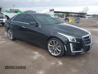2014 Cadillac CTS Vsport Premium RWD z VIN 1G6AV5S89E0148907, wystawiony jako IAAI lot #41880678 z przebiegiem 148 052 mil mil oraz . Historia ofert i sprzedaży dostępna na DreamBid. Obrazek 1.