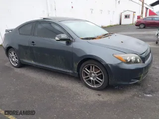 2010 Scion tC with VIN JTKDE3B75A0314185, listed as a IAAI auction lot 41369224 with 164,244 mi miles. Bid and sale history available at carsss.com. Image 1.