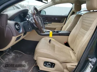 2016 Jaguar XJ Portfolio z VIN SAJWJ2GD0G8V92850, wystawiony jako Copart lot #47844065 z przebiegiem 99 652 mil mil oraz Szkoda całkowita • Salvage title. Historia ofert i sprzedaży dostępna na DreamBid. Obrazek 7.