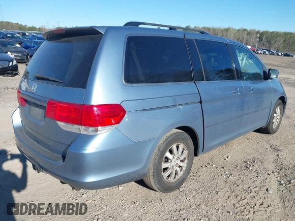 2010 Honda Odyssey EX-L with VIN 5FNRL3H77AB096732, listed as a IAAI auction lot 41831744 with 22,523 mi miles and . Bid and sale history available at DreamBid. Image 4.