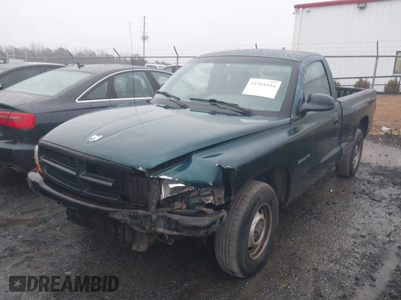 1999 Dodge Dakota SLT with VIN 1B7FL26XXXS209424, listed as a IAAI auction lot 41264544 with 70,523 mi miles. Bid and sale history available at carsss.com. Image 6.