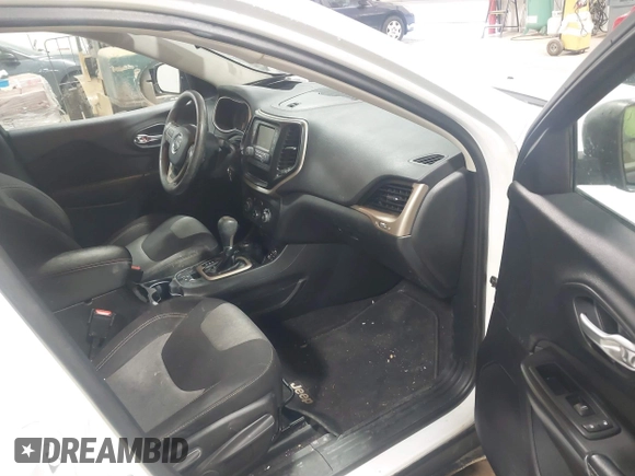 2016 Jeep Cherokee Sport with VIN 1C4PJMAS0GW254799, listed as a IAAI auction lot 41582436 with 140,471 mi miles and . Bid and sale history available at DreamBid. Image 5.