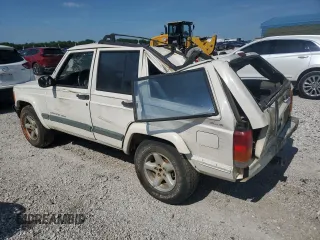 1999 Jeep Cherokee Sport z VIN 1J4FF68S3XL597049, wystawiony jako Copart lot #58736325 z przebiegiem 134 684 mil mil oraz Nie do naprawy • Non repairable. Historia ofert i sprzedaży dostępna na DreamBid. Obrazek 2.