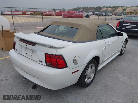 2001 Ford Mustang Deluxe с VIN 1FAFP44471F226003, выставлен на аукционе IAAI как лот 42079409 с пробегом 145 021 миль миль и . История ставок и продаж доступна на DreamBid. Изображение 4.