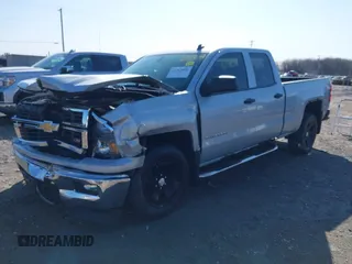 2014 Chevrolet Silverado 1500 LT with VIN 1GCVKREC0EZ151088, listed as a IAAI auction lot 41763808 with 124,668 mi miles and . Bid and sale history available at DreamBid. Image 17.