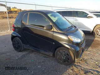 2009 Smart fortwo Pure with VIN WMEEJ31X69K331684, listed as a IAAI auction lot 41770804 with 112,611 mi miles. Bid and sale history available at carsss.com. Image 1.