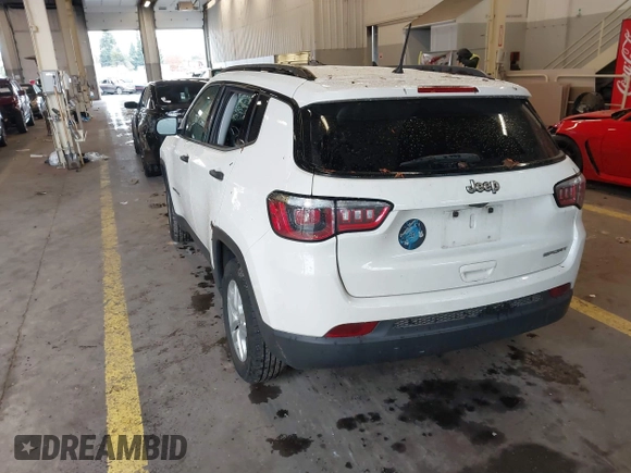 2018 Jeep Compass Sport with VIN 3C4NJCAB6JT124198, listed as a IAAI auction lot 41192196 with 104,557 mi miles. Bid and sale history available at carsss.com. Image 3.