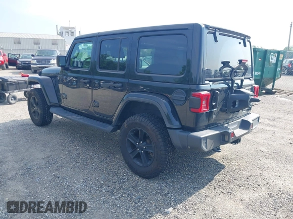 2020 Jeep Wrangler Unlimited Sahara High Altitude with VIN 1C4HJXEGXLW182581, listed as a IAAI auction lot 42612084 with 52,656 mi miles and . Bid and sale history available at DreamBid. Image 3.