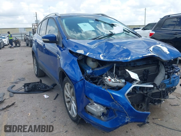 2017 Ford Escape Titanium with VIN 1FMCU0JD3HUE35131, listed as a IAAI auction lot 42062019 with 108,470 mi miles and . Bid and sale history available at DreamBid. Image 1.