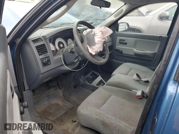2005 Dodge Dakota с VIN 1D7HW22N85S164328, выставлен на аукционе Copart как лот 50151155 с пробегом Не указан миль и Списание • Salvage title. История ставок и продаж доступна на DreamBid. Изображение 8.