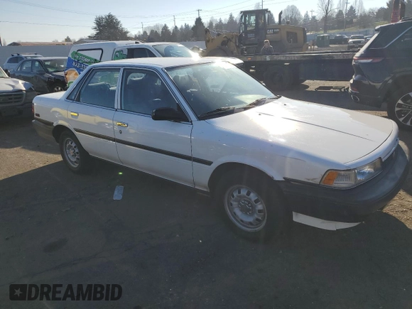 1991 Toyota Camry z VIN 4T1SV24E0MU424347, wystawiony jako Copart lot #42566695 z przebiegiem 162 334 mil mil oraz Szkoda całkowita • Salvage title. Historia ofert i sprzedaży dostępna na DreamBid. Obrazek 4.