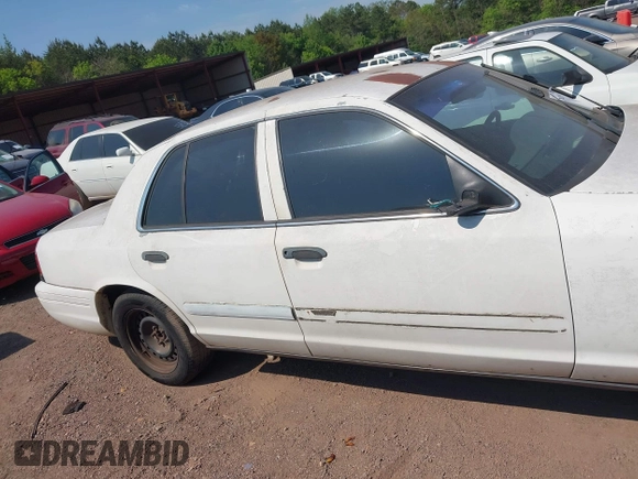 2001 Ford Crown Victoria Police Interceptor z VIN 2FAFP71W21X165218, wystawiony jako IAAI lot #42062199 z przebiegiem 233 978 mil mil oraz . Historia ofert i sprzedaży dostępna na DreamBid. Obrazek 13.