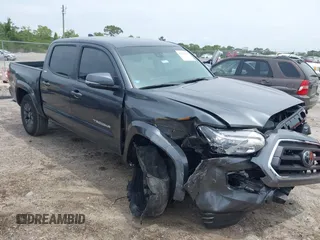 2023 Toyota Tacoma SR with VIN 3TMCZ5AN4PM594481, listed as a IAAI auction lot 42207121 with 12,532 mi miles and . Bid and sale history available at DreamBid. Image 1.