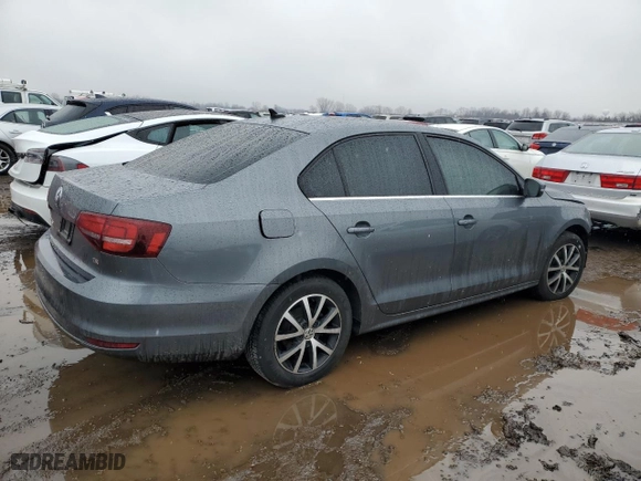 2018 Volkswagen Jetta 1.4T SE with VIN 3VWDB7AJ8JM258502, listed as a Copart auction lot 48209785 with 51,943 mi miles and Salvage Title. Bid and sale history available at carsss.com. Image 3.