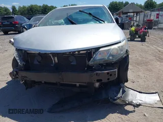 2014 Toyota Camry L with VIN 4T1BF1FK1EU414194, listed as a IAAI auction lot 42807873 with 108,994 mi miles and . Bid and sale history available at DreamBid. Image 6.