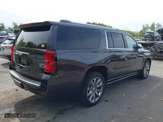 2015 Chevrolet Suburban LTZ with VIN 1GNSKKKC6FR243250, listed as a IAAI auction lot 40464836 with 120,030 mi miles. Bid and sale history available at carsss.com. Image 4.