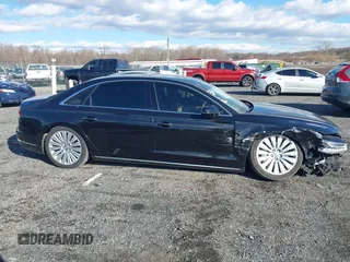 2015 Audi A8 L 4.0T with VIN WAU32AFD4FN014063, listed as a IAAI auction lot 41501970 with 158,570 mi miles. Bid and sale history available at carsss.com. Image 14.