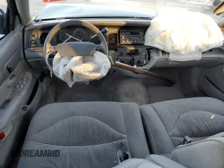 1996 Ford Crown Victoria LX z VIN 2FALP74W0TX205507, wystawiony jako Copart lot #85310874 z przebiegiem 51 646 mil mil oraz Szkoda całkowita • Salvage title. Historia ofert i sprzedaży dostępna na DreamBid. Obrazek 8.