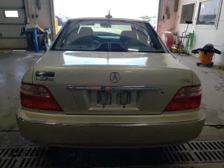2004 Acura RL w/Navigation System z VIN JH4KA96644C004769, wystawiony jako Copart lot #59800205 z przebiegiem 172 279 mil mil oraz Szkoda całkowita • Salvage title. Historia ofert i sprzedaży dostępna na DreamBid. Obrazek 6.