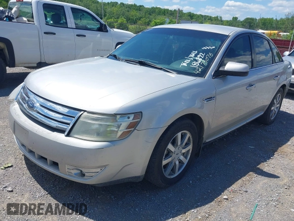 2008 Ford Taurus SEL z VIN 1FAHP24W28G186822, wystawiony jako IAAI lot #42173076 z przebiegiem 243 849 mil mil oraz . Historia ofert i sprzedaży dostępna na DreamBid. Obrazek 2.