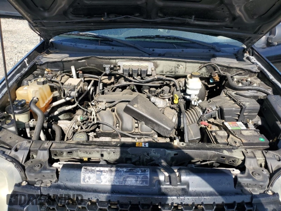 2006 Ford Escape Limited z VIN 1FMCU04146KA60909, wystawiony jako Copart lot #58019215 z przebiegiem 156 752 mil mil oraz Szkoda całkowita • Salvage title. Historia ofert i sprzedaży dostępna na DreamBid. Obrazek 12.