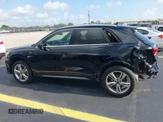 2021 Audi Q3 S line Premium z VIN WA1DECF33M1038760, wystawiony jako IAAI lot #42347743 z przebiegiem 26 675 mil mil oraz . Historia ofert i sprzedaży dostępna na DreamBid. Obrazek 15.