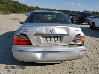2000 Acura RL w/Navigation System with VIN JH4KA9668YC015201, listed as a Copart auction lot 75046704 with Not Provided miles and Salvage Title. Bid and sale history available at DreamBid. Image 6.