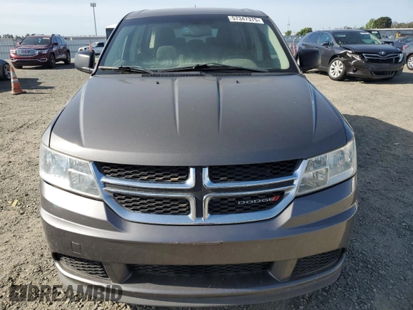 2013 Dodge Journey American Value with VIN 3C4PDCAB8DT590509, listed as a Copart auction lot 57347375 with 203,642 mi miles and Clean title. Bid and sale history available at DreamBid. Image 5.